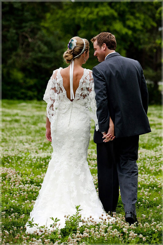bride groom holding hands smiling best photography